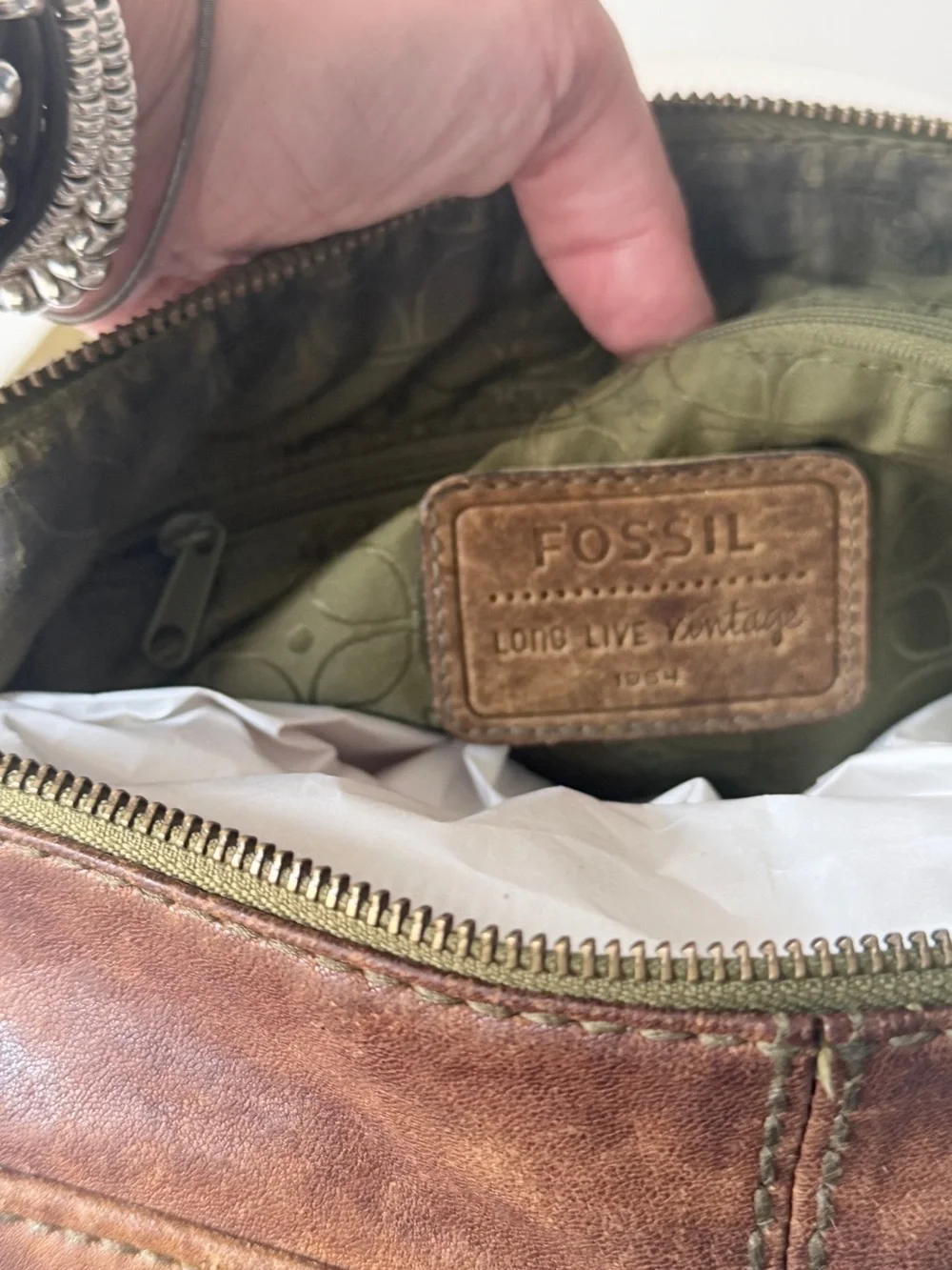 Hyper Distressed Fossil Vintage Bag.
